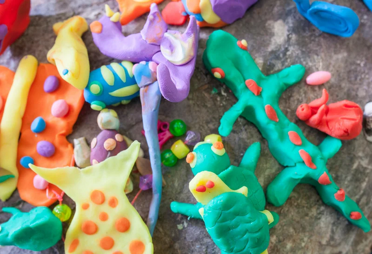 assortment of animals made of playdough